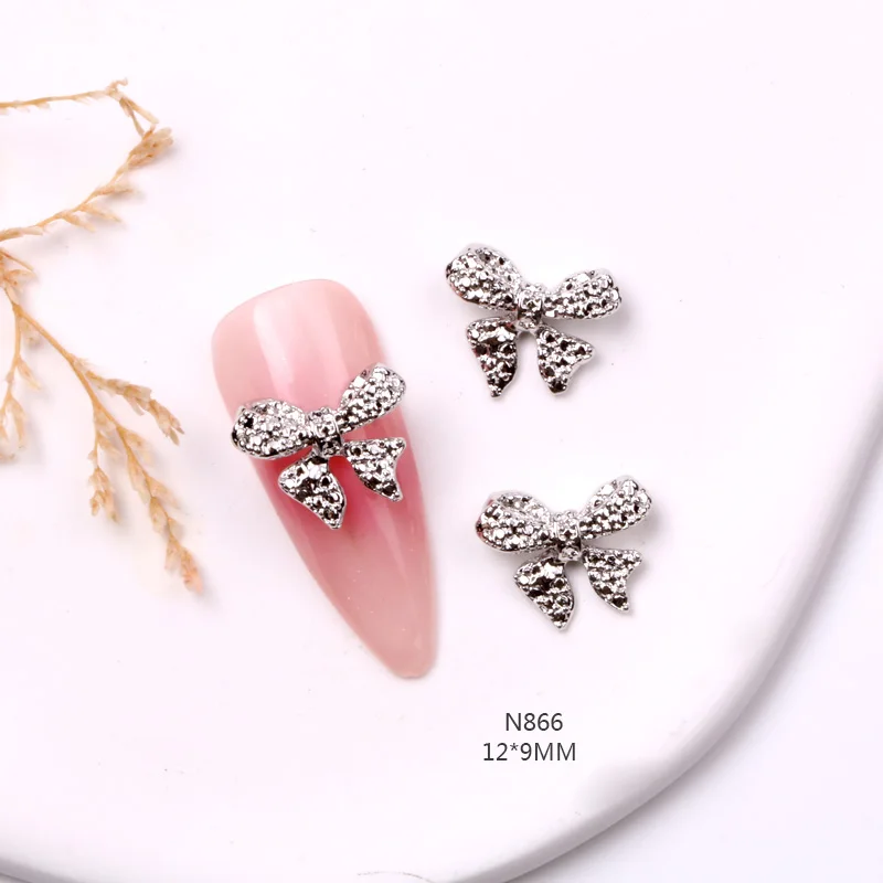 TSZS-Prata Bowknot Fita Nail Art Encantos Jóias, Bowknot 3D, cinza Rhinestones, 3D Bow Shaped Liga Decoração prego, 10pcs