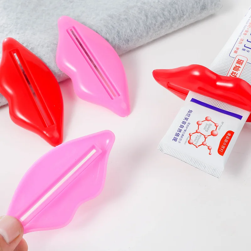 1Pcs Top Sale Sexy Hot Lip Kiss Bathroom Tube Dispenser Toothpaste Cream Squeezer Home Tube Rolling Holder Squeezer Random Color