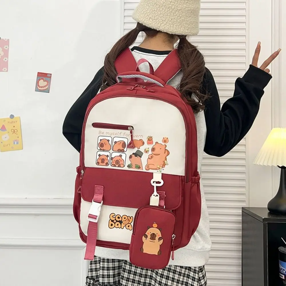 Mochila escolar de nylon de desenho animado capivara, mochila de grande capacidade à prova d'água para aliviar a carga, estudantes