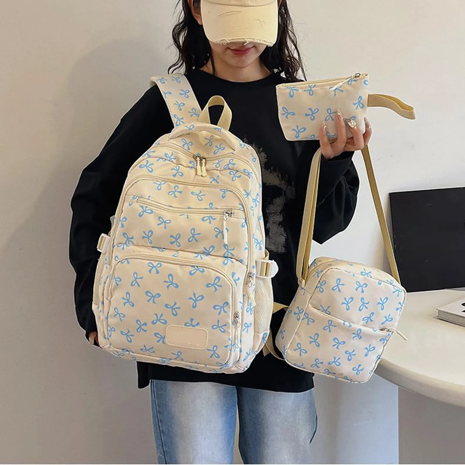 حقيبة ظهر نسائية كورية عصرية مطبوعة بفيونكة خفيفة الوزن وبسيطة حقيبة مدرسية للطلاب قابلة للتعديل طقم حقيبة نسائية مكون من ثلاث قطع