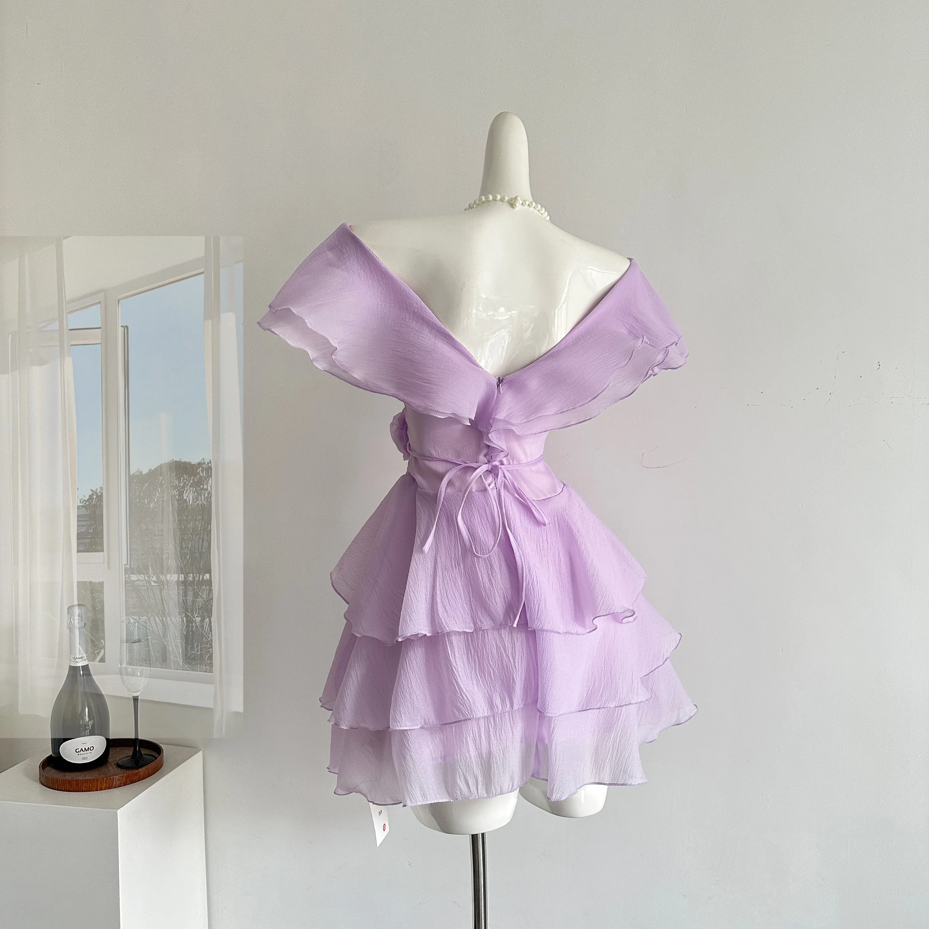 Feminino elegante em camadas babados vestido sem mangas senhora verão cor sólida slash neck festa férias magro mini vestido