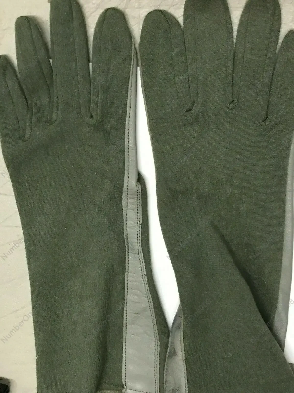 The Air Force has issued new 00S flame-retardant fabric tactical flying gloves with small green claws