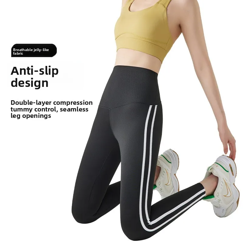 2025 Nuovi pantaloni da yoga slim fit elastici in pelle arca Abbigliamento da esterno da donna Pantaloni da yoga sportivi in nylon a vita alta a nove punti