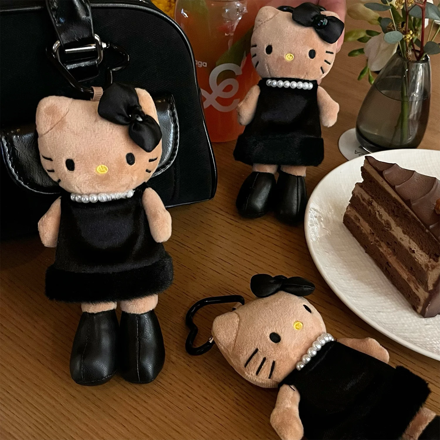 سلسلة مفاتيح جلدية سوداء جذابة على شكل قطة، قلادة حقيبة صغيرة، دمية كرتونية لطيفة بنقشة الفهد، إكسسوار حقيبة NICHAOPIAOLIANG