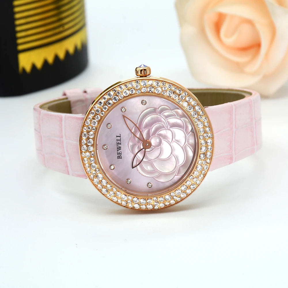 Reloj de mujer de cuarzo de acero inoxidable a la moda con correa de cuero con incrustaciones de diamantes y esfera de flores