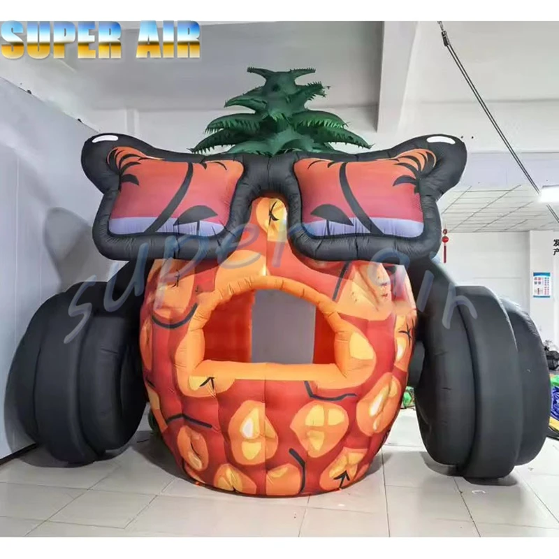 Nadmuchiwany ananas z słuchawkami do dekoracji sceny na festiwal muzyczny na świeżym powietrzu