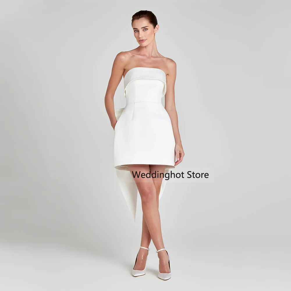 فساتين كوكتيل الزفاف للعروس بدون حمالات بفيونكة كبيرة فساتين كوكتيل صغيرة للنساء 2025 فستان زفاف قصير بدون أكمام