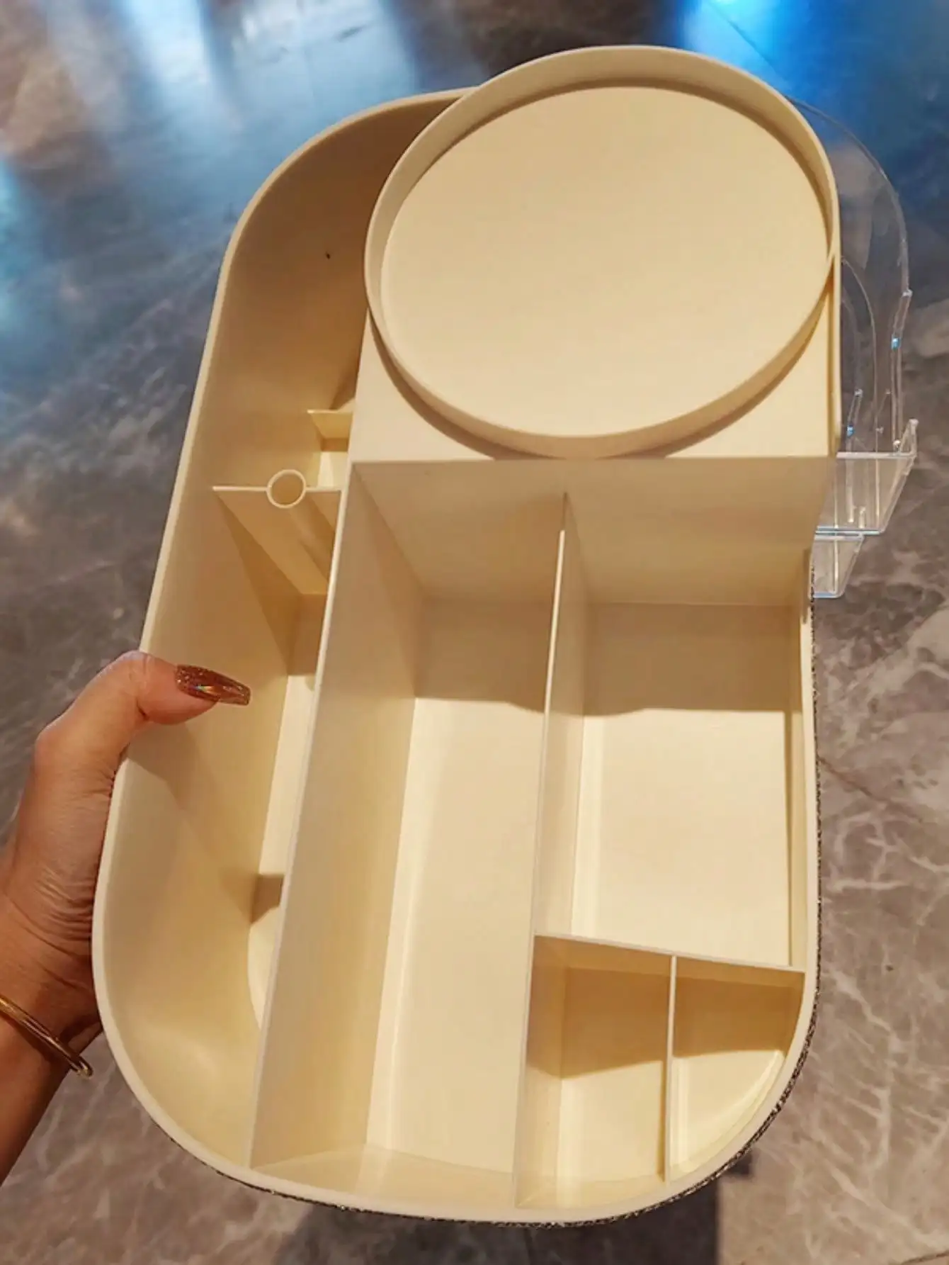 One artificial diamond-encrusted makeup brush and a drawer-style storage box for skin care products