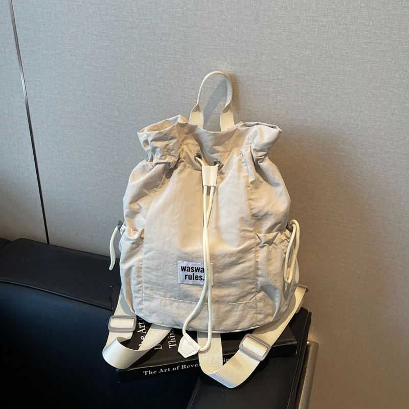 

2025 New Trend Versatile Backpack Niche Design Concise Light Large Capacity Drawstring Commute College Student School Bags