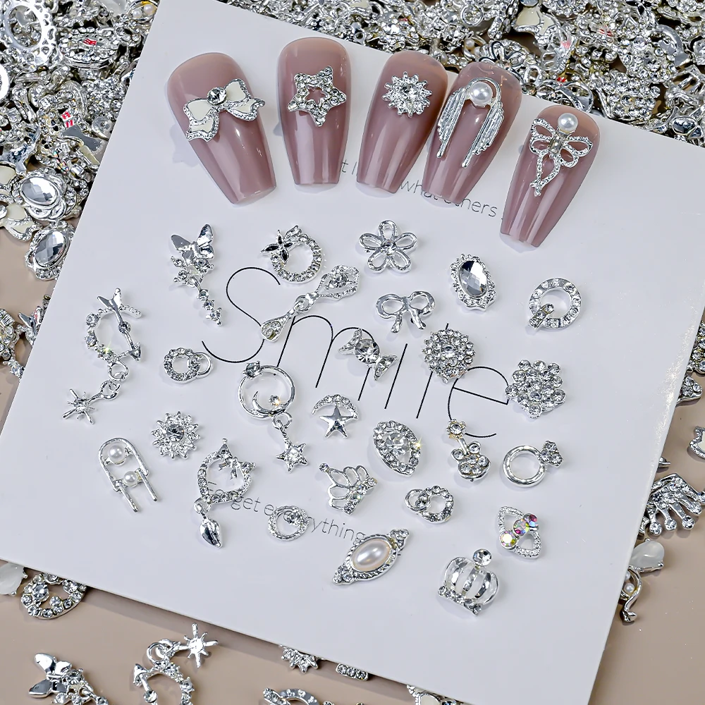 50 個 3D ランダムネイルアートチャーム混合シルバーちょう結び花文字合金リベットネイルアート装飾 DIY 工芸品マニキュアアクセサリー