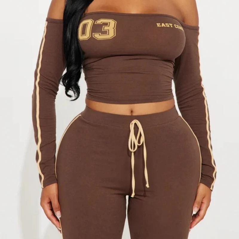 Grenzüberschreitende Damenmode im europäischen und amerikanischen Stil, Frühlingsneuheit, One-Shoulder-Oberteil, temperamentvoll, vielseitig, figurbetontes Set