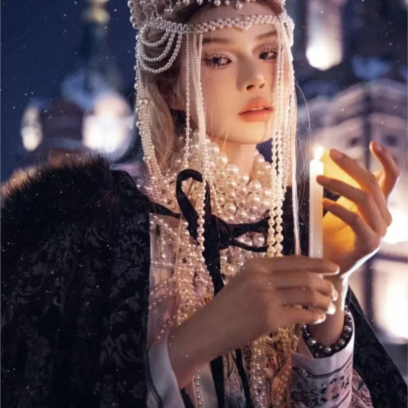 Travel photo exotic costume Black cape snow