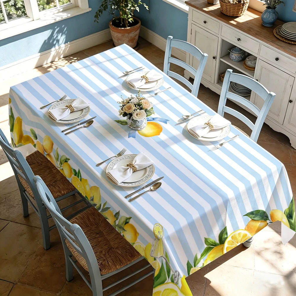 One blue and white striped lemon print tablecloth, made of durable polyester in a summer country cottage style