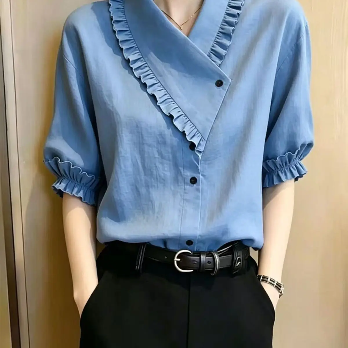 Blue diagonal ruffle edge shirt women's summer design fungus edge bubble sleeves loose and thin commuting versatile shirt