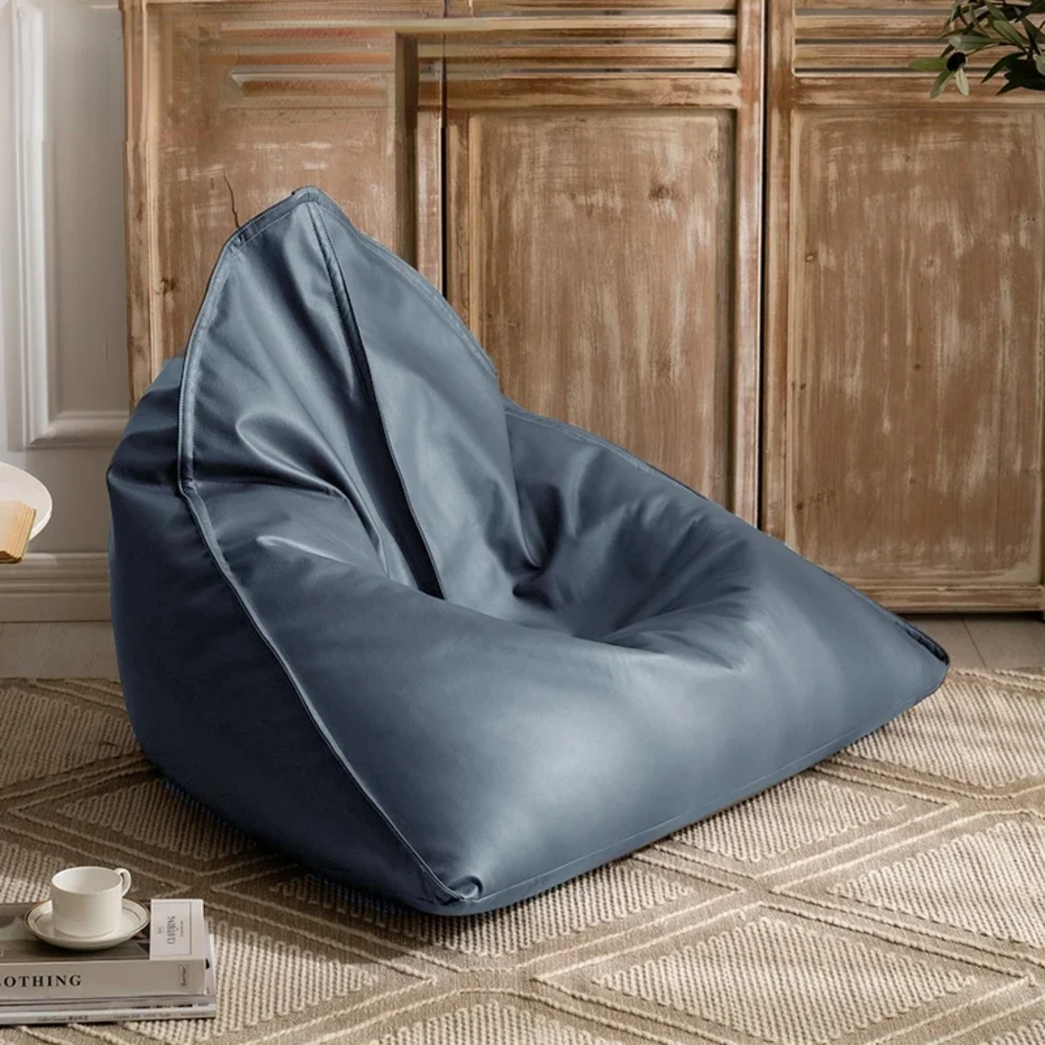 Experience ultimate comfort and sophistication with this luxurious modern faux leather triangle bean bag. Elevate your home deco