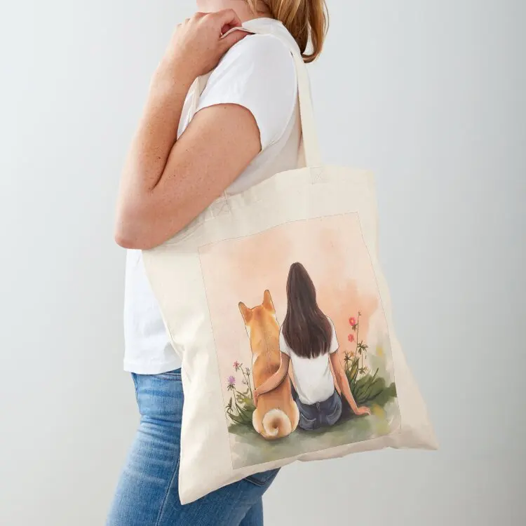 

Brown hair Girl with her Shiba Inu dog sitting among wildflowers watercolor illustration Tote Bag