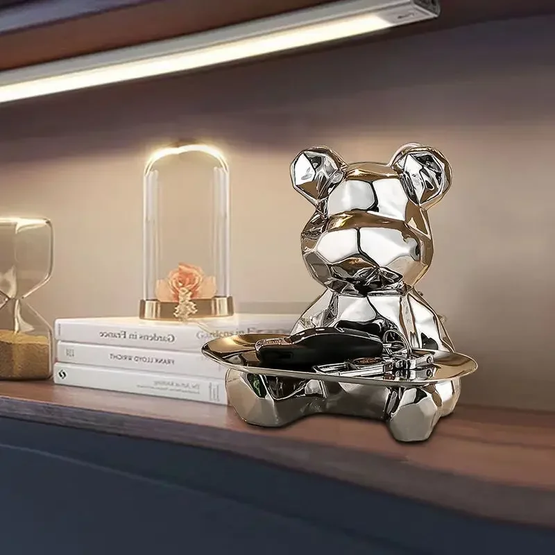 

Geometric bear statue with tray storage, ceramic plating piggy bank, key, cosmetic storage box, bookshelf statue decoration.