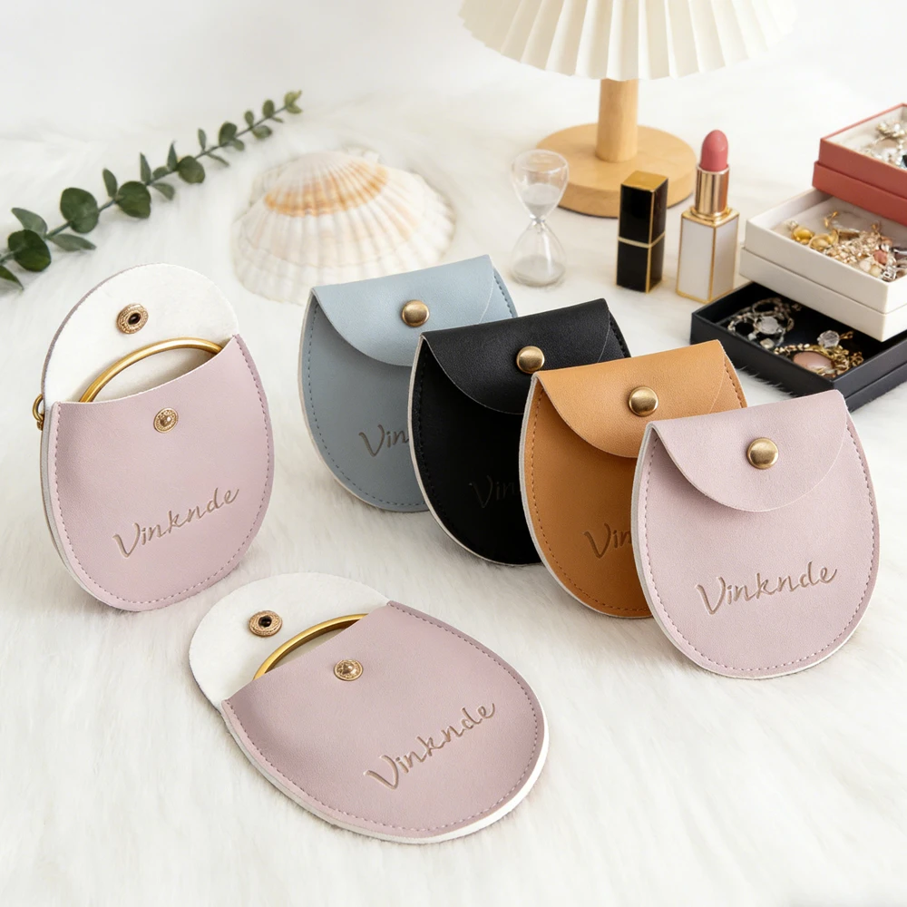 

Массовая кожаная сумка для хранения с логотипом, мини-пакет с застежкой и золотой кнопкой для свадебных путешествий, ювелирных изделий, рождественской подарочной упаковки