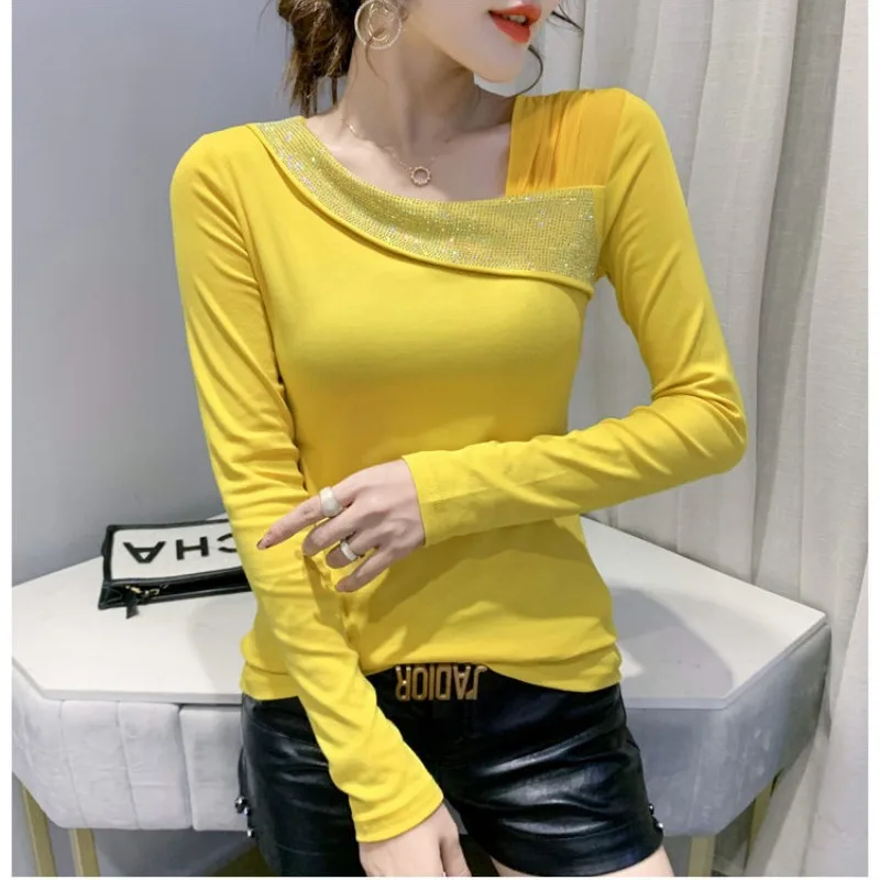 เสื้อสวมหัวแขนยาวแฟชั่นแบบใหม่ในฤดูใบไม้ร่วงแนวทแยงสำหรับผู้หญิงเสื้อเชิ้ตเรียบง่ายเสื้อลำลองอเนกประสงค์เสื้อยืดผู้หญิงตะวันตกสำหรับฤดูใบไม้ผลิ