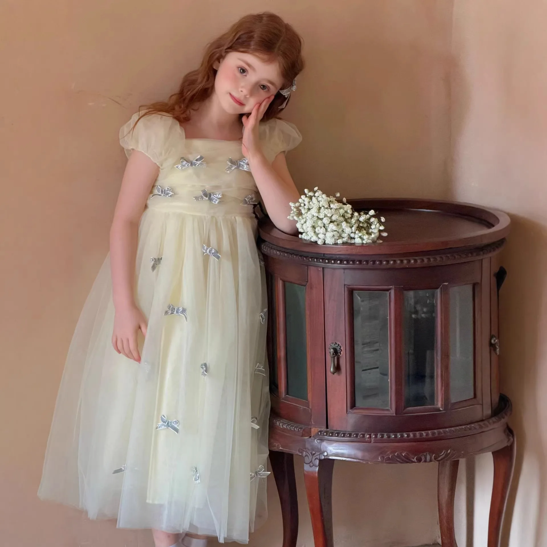 

Children's clothing girls' dress 2026 spring/summer new style mesh beautiful yellow bow yarn skirt