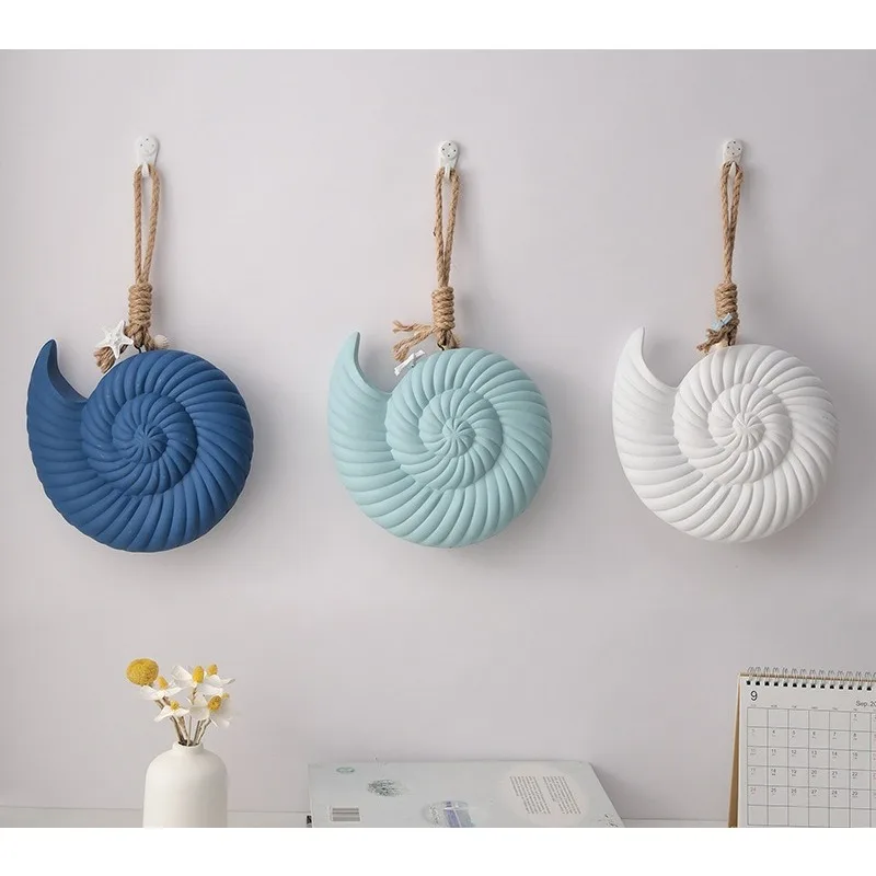 

Mediterranean-style shell, starfish & conch wall hangings, minimalist ocean vibe, perfect decor for restaurants & bars