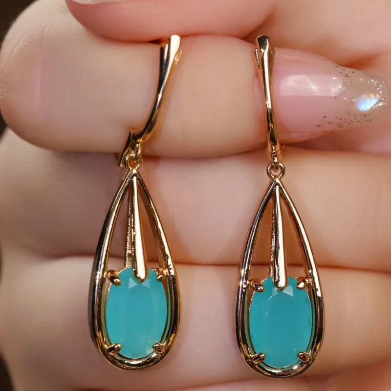 Women's Trendy Simple 2026 New Four Claw Egg Shaped Water Drop Ear Buckle Jewelry Fashion Accessory
