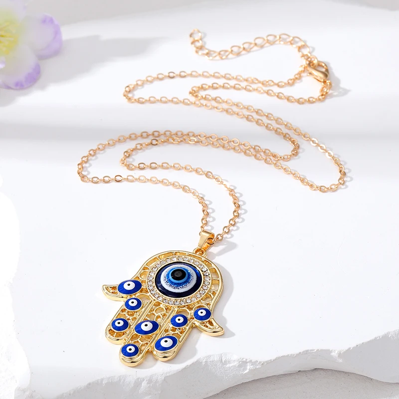 Enamel Retro Turkey Eye Hamsa Hand Necklace Women Men New Hollow Ethnic Zircon Blue Evil Eye Fatima Hand Sweater Chians Jewelry