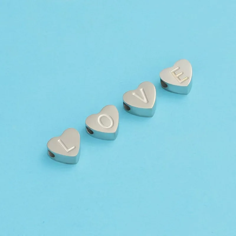 CARLIDANA High Polish Stainless Steel Silver Color 7*6mm Engraved Letter Alphabet Initial Perforated Heart Charm Accessories