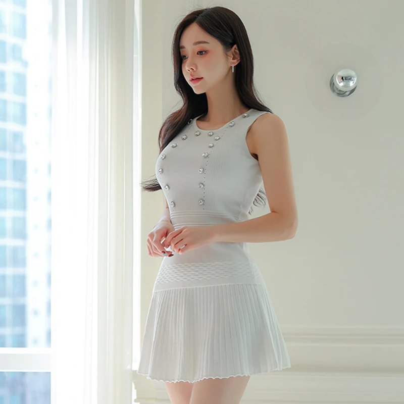 2025 여름 신상 민소매 라운드넥 다이아몬드 니트 셔츠 탑 + 숏 스커트 투피스 세트 플리츠 드레스