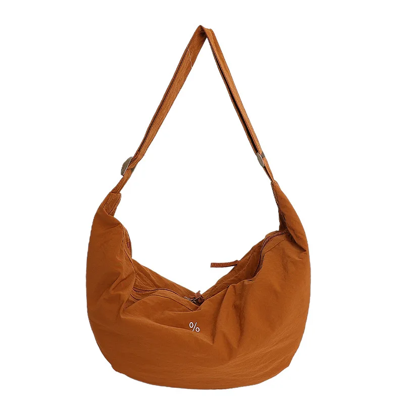 

Simple Solid Color Large Capacity Crossbody Dumpling Bag for Women2025New Fashion Versatile Large Nylon Bag Horn Bag