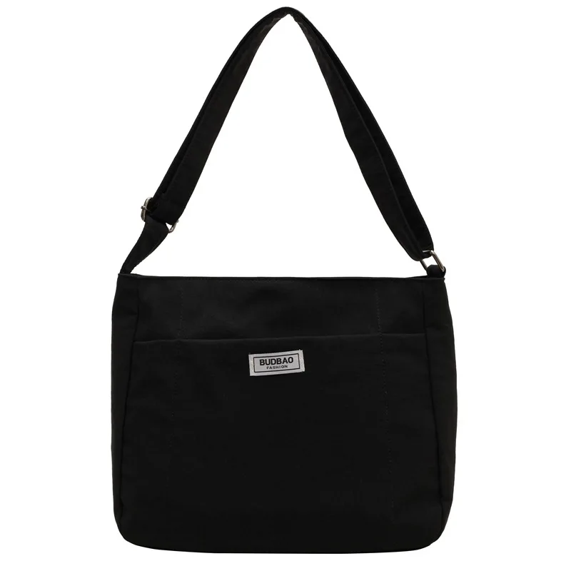 Bolsa de ombro de lona de grande capacidade para mulheres, bolsa tiracolo simples para estudantes, elegante e casual, nova, 2024