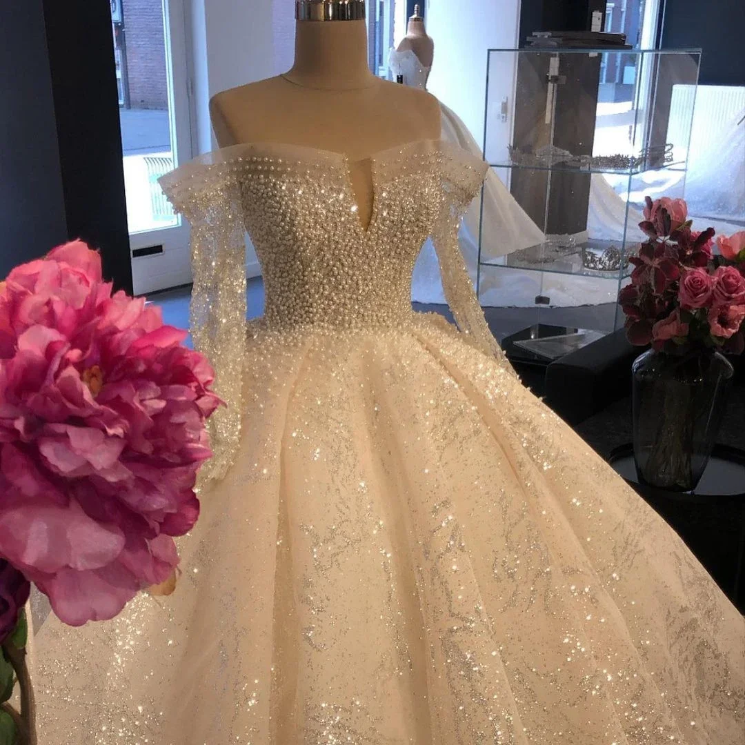 Abiti da sposa champagne glitterati Paillettes Abito da ballo con perline Abiti da sposa da chiesa Maniche lunghe Extra gonfi Personalizzato 2025