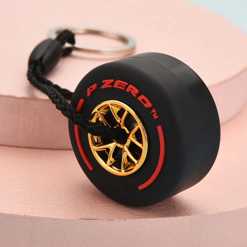 Luxus Mini F1 Racing Reifen Schlüsselbund Auto Schlüssel Zubehör PVC Reifen Anhänger Tasche Charme männer Gadgets Geschenke Für Freunde auto Liebhaber