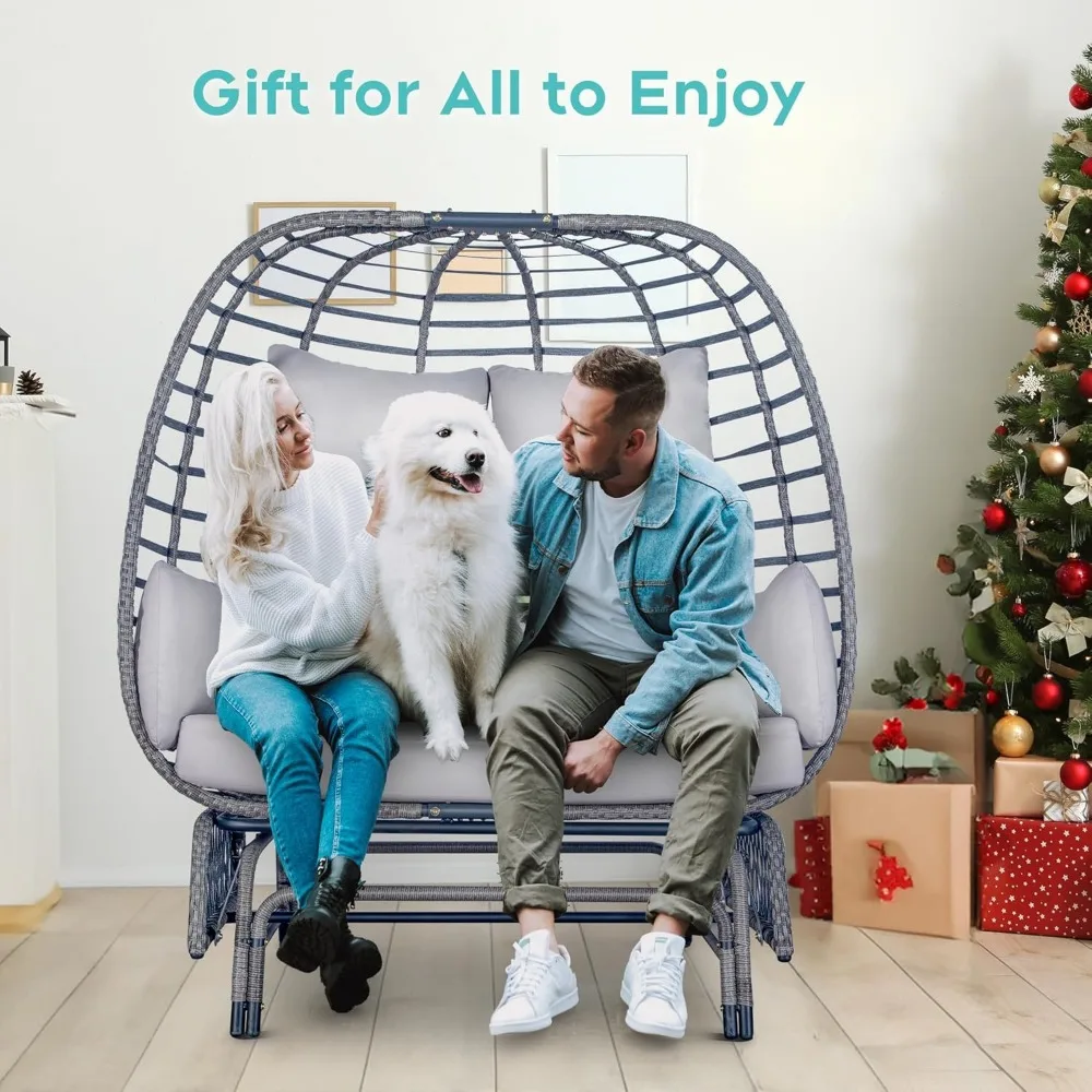 durable two-person outdoor wicker rocking chair with steel base, supporting up to 500 pounds