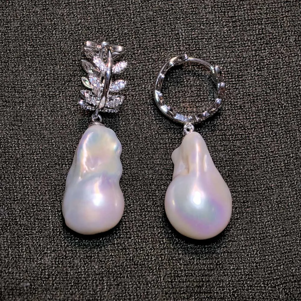 

Серьги-подвески MTC·STAR в форме пшеничных колосьев, 23 мм, белые, в стиле барокко, с жемчугом Кеши и фианитами (Z14557)