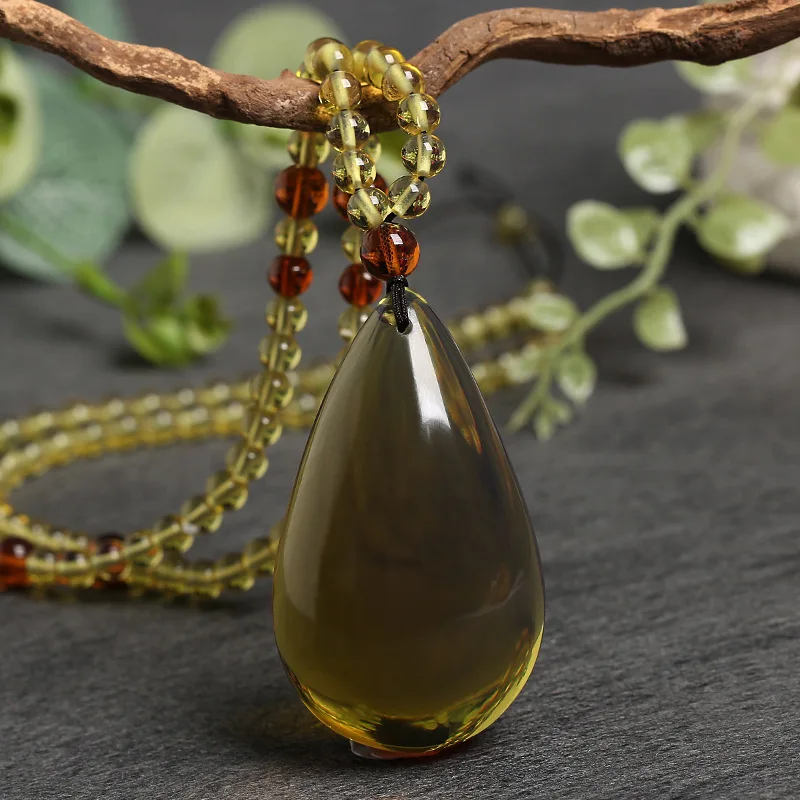 Natural yellow stone teardrop pendant men and women's peace and prosperity sign chicken butter yellow pendant necklace