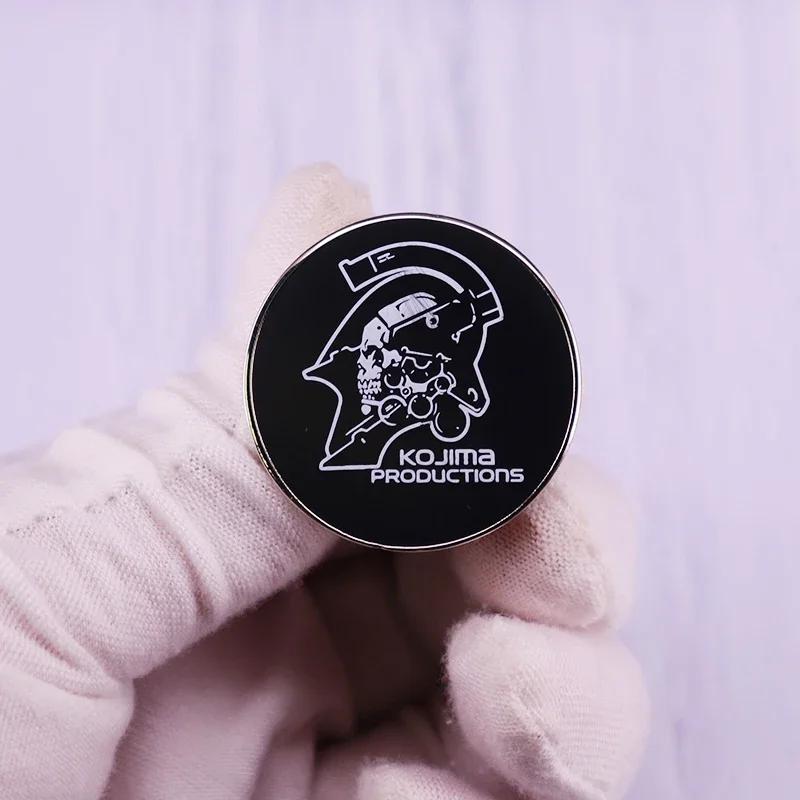 Death Stranding Kojima Productions  Logo Pin Ludens Play Gmes With Science And Strategy Button Brooch