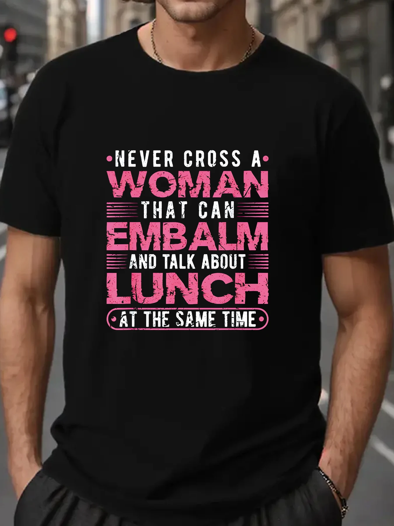 New Summer 2024 NEVER CROSS A WOMAN THAT CAN EMBALM AND TALK ABOUT LUNCH AT THE SAME TIME men t shirt