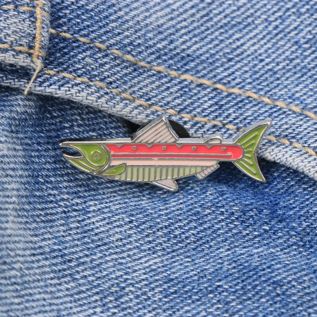 Geometric Salmon Enamel Pin, Stylized Fish Brooch with Tribal Color Scheme, Metallic Nature-Themed Metal Badge for Jackets