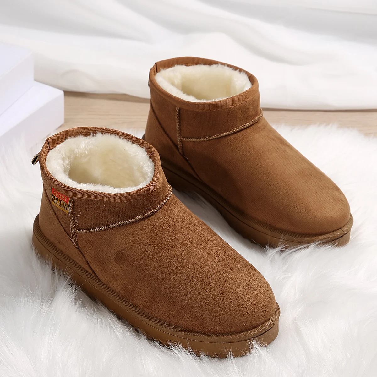 Snowshoe woman fur one of the new fashion short tube thicken warm cotton shoes lovers