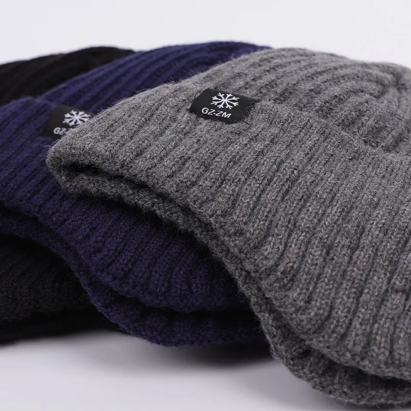 Cappello lavorato a maglia invernale da uomo all'aperto Peluche Calore Berretto con visiera Paraorecchie Moda casual Foderato in pelliccia sintetica Cappelli bomber Protezione per le orecchie da ciclismo