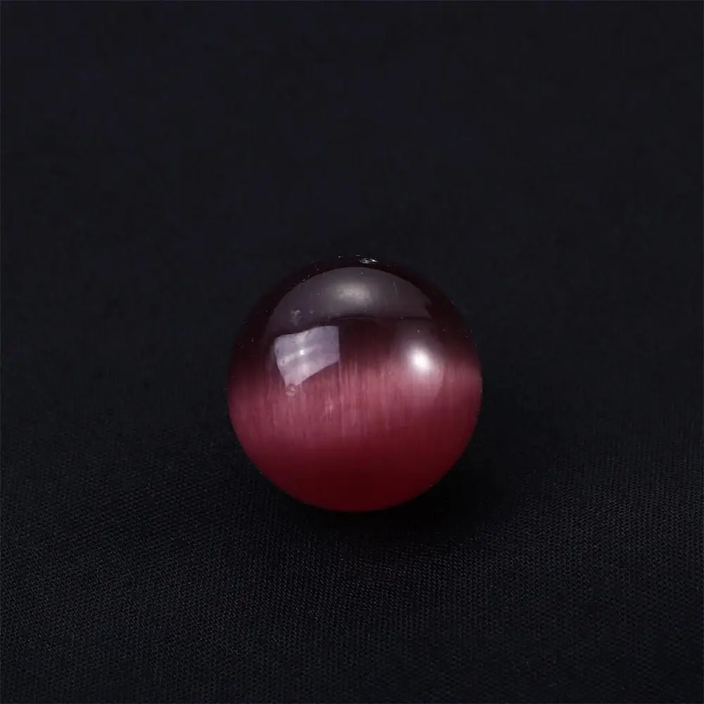Sfera di cristallo Decorazione colorata per ufficio Giochi di marmo Biglie di vetro Palla di vetro Giocattoli Sfera colorata dell'occhio di gatto Pietra dell'occhio di gatto
