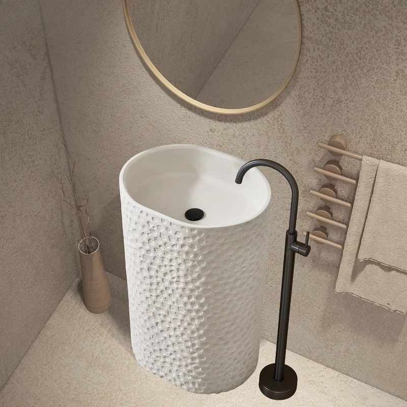 

Japanese wabi-sandy wind personalized wash basin designer integrated floor-to-ceiling wash table creative art travertine pillar