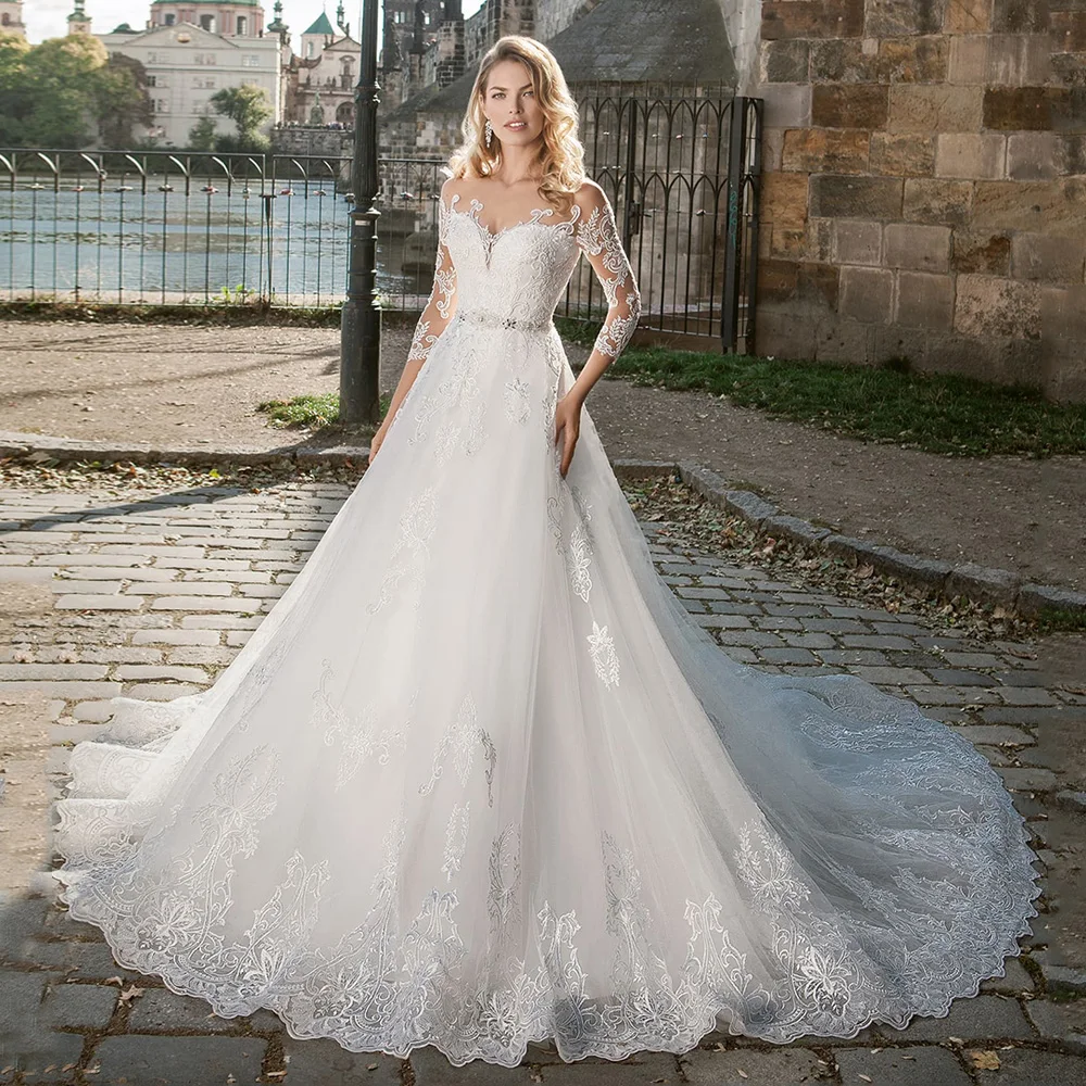Klassieke Trouwjurk Doorschijnende Ronde Hals Lange Mouwen Kralen Riem Kant Applique Court Trein Robe De Mariee Bruidsjurken Voor Bruid