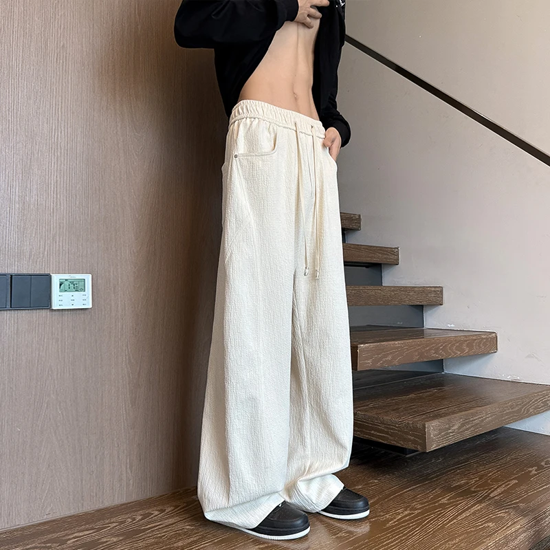 กางเกงวอร์มชายไซส์ใหญ่ M-XXXXXL สีพื้น ชายโค้ง ทรงหลวม สไตล์จ็อกเกอร์ มีเชือกผูกเอว สำหรับฤดูใบไม้ผลิและฤดูใบไม้ร่วง