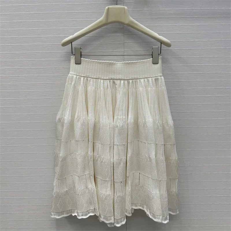 

Women's skirt New elastic knitted slim women's half skirt for autumn 2025 High waisted hollow mini skirt Short skirt cake skirt