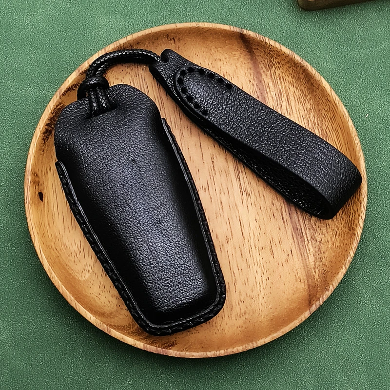 

Simple Style Black Goat Leather Car Remote Key Case Cover for BYD Han Tang Qing EV DMI Elegant and Graceful High Fashion