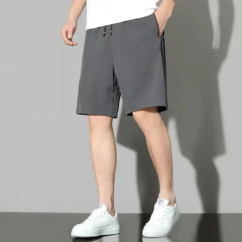 Qui Dry Ice Silk herenorts zomer dunne casual losse basketbal hardlopen sport vijfkwart lengte broek polyestervezel