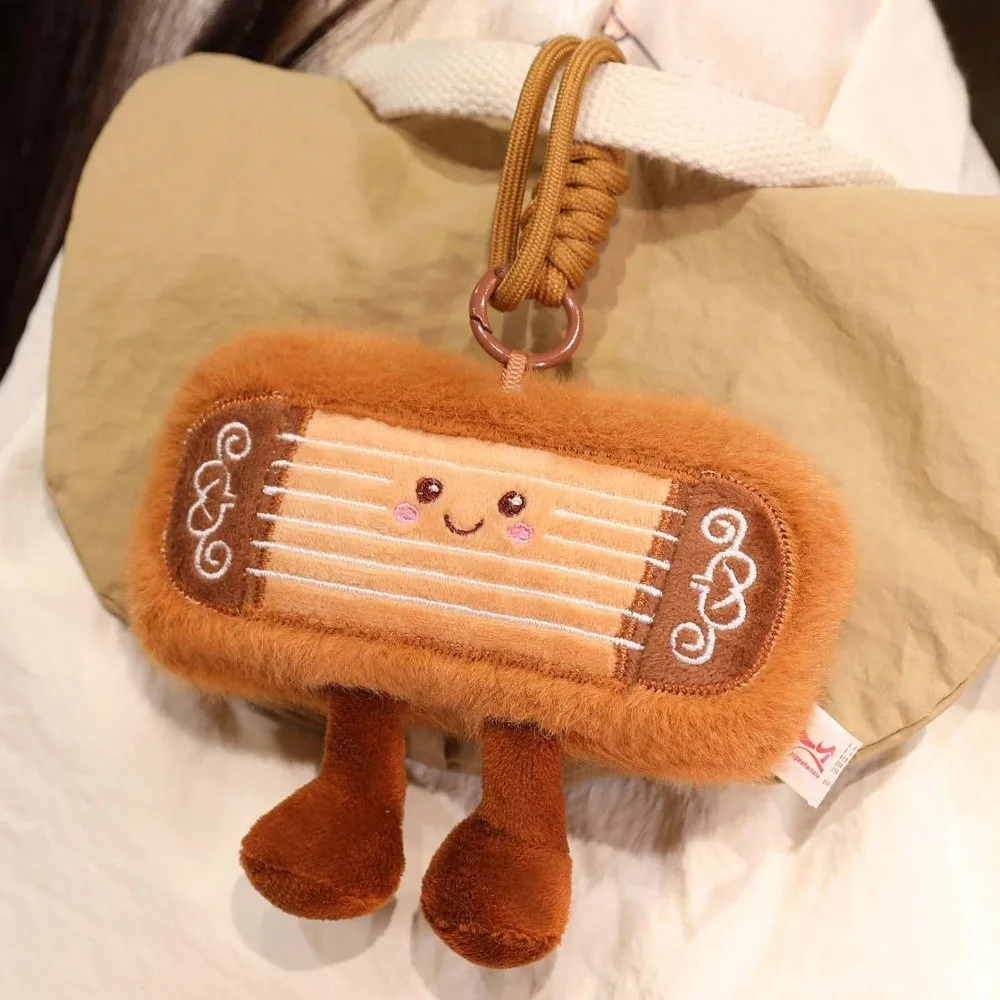 Simpatico portachiavi con strumento simulato Kawaii morbido ciondolo con cetra cinese farcito ciondolo Guzheng cartone animato regalo di Natale