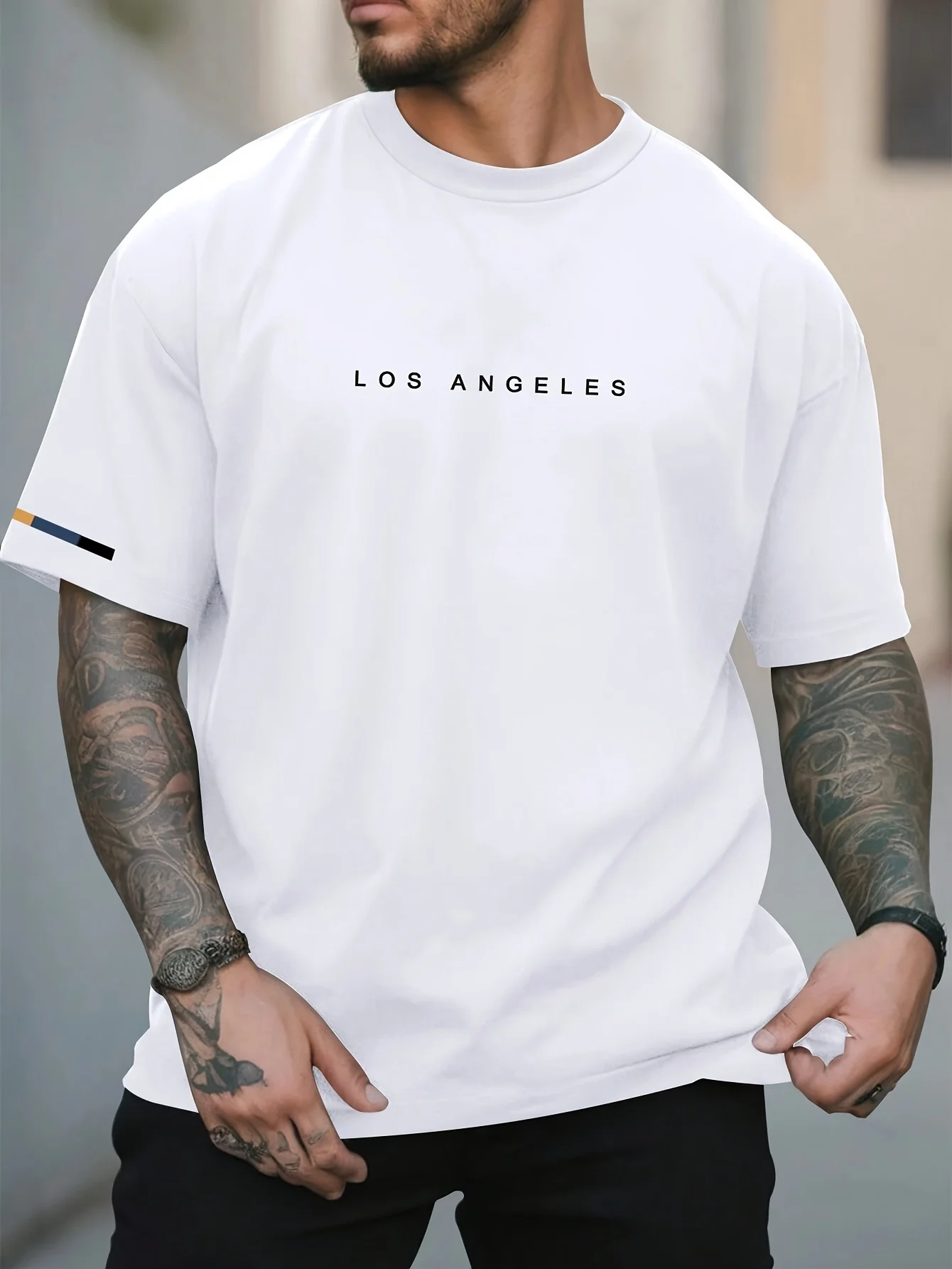 2025 لوس أنجلوس جرافيك طباعة الرجال العلامة التجارية الفاخرة القطن المعتاد قصيرة الأكمام الصيف للجنسين الرجال النساء بلوزة الشارع الشهير المحملة